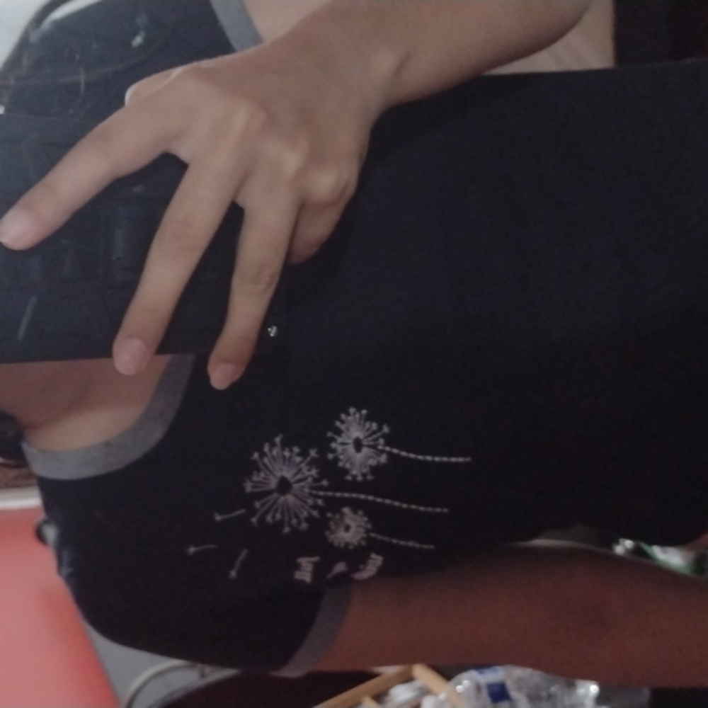 Black crop top with small lettering